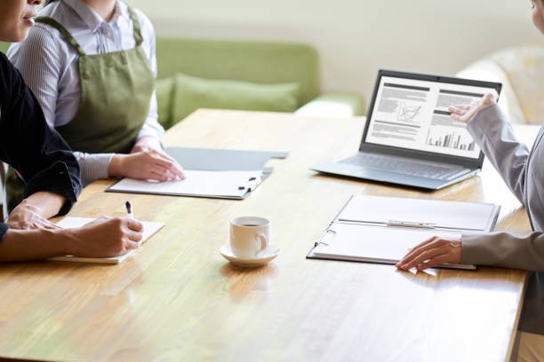 Asian business woman selling to restaurant owners SEO Services For Marketing Agency
