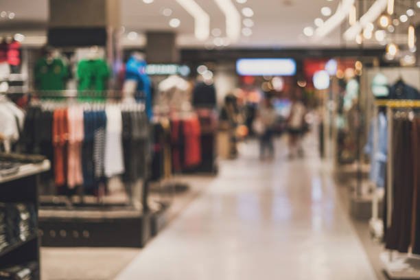 abstract blurred background of Department store in Shopping Mall, Vintage tone SEO Services For Garments